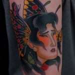 Japanese butterfly geisha head by guest artist Justin Essing at the best Jacksonville Tattoo Shop near me, Mister Tattoo